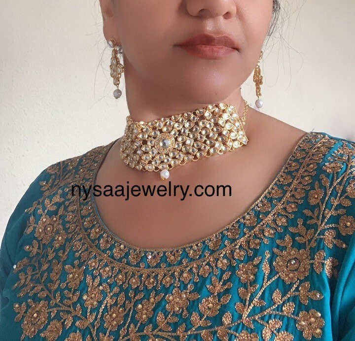 Gold plated kundan choker set with earrings and Maang tikka