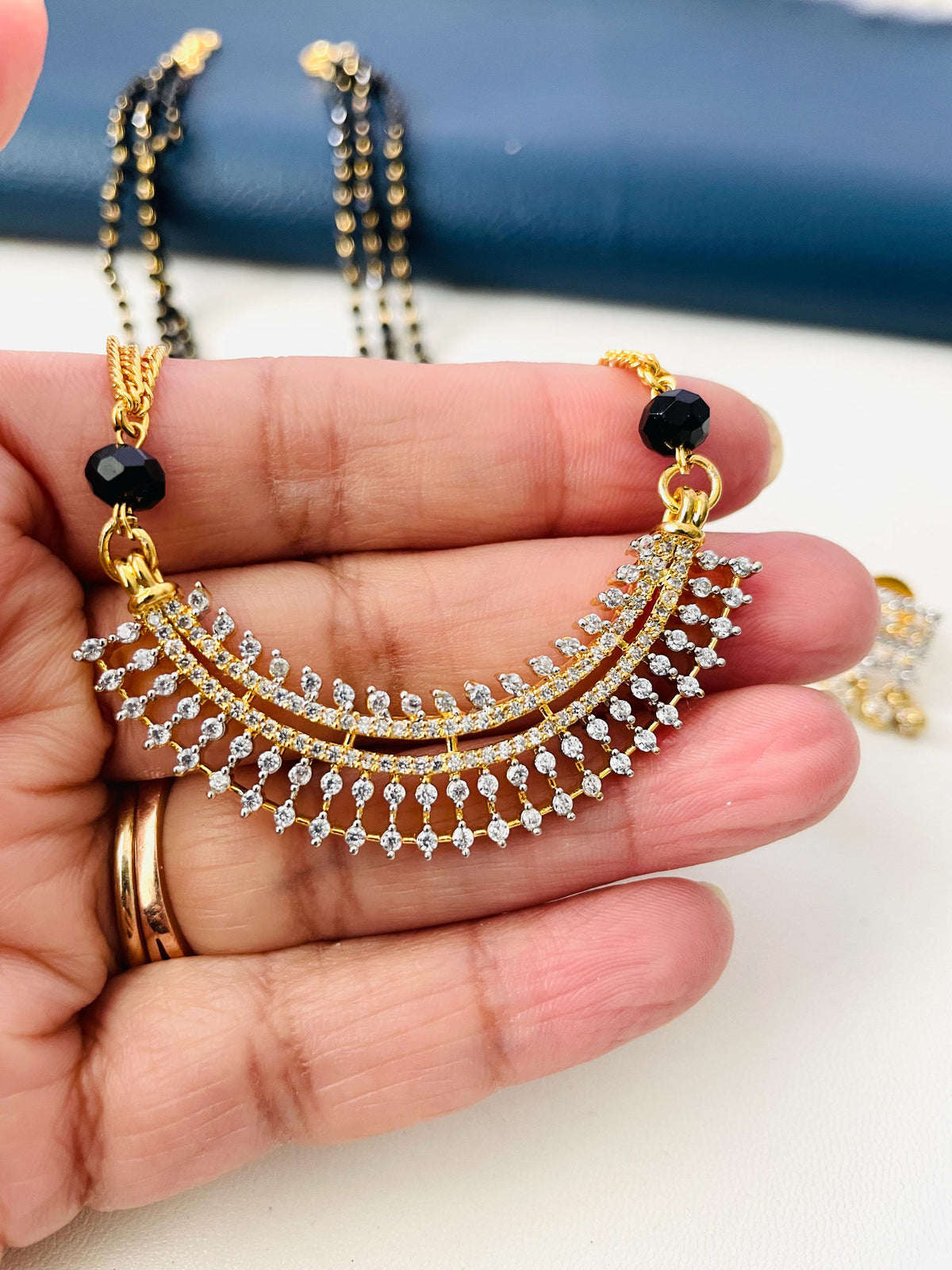 Three strand CZ pendant gold plated black beaded Mangalsutra