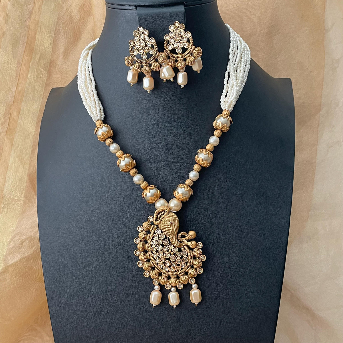 Rajawadi Polish Ganapati Pendant Necklace Set: Antique Gold Pearl Jewelry