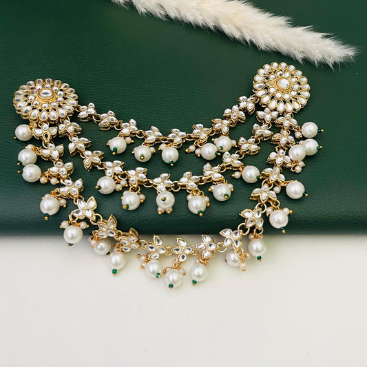 Gold plated kundan and pearl hair accessory