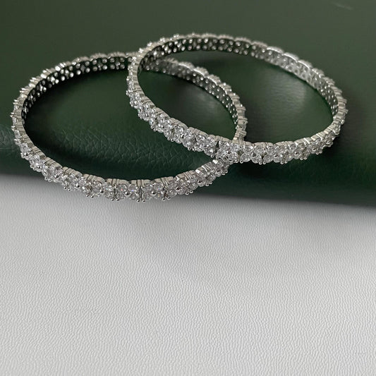 beautiful 4 petal flower design in cubic zirconia rhodium plated bangles