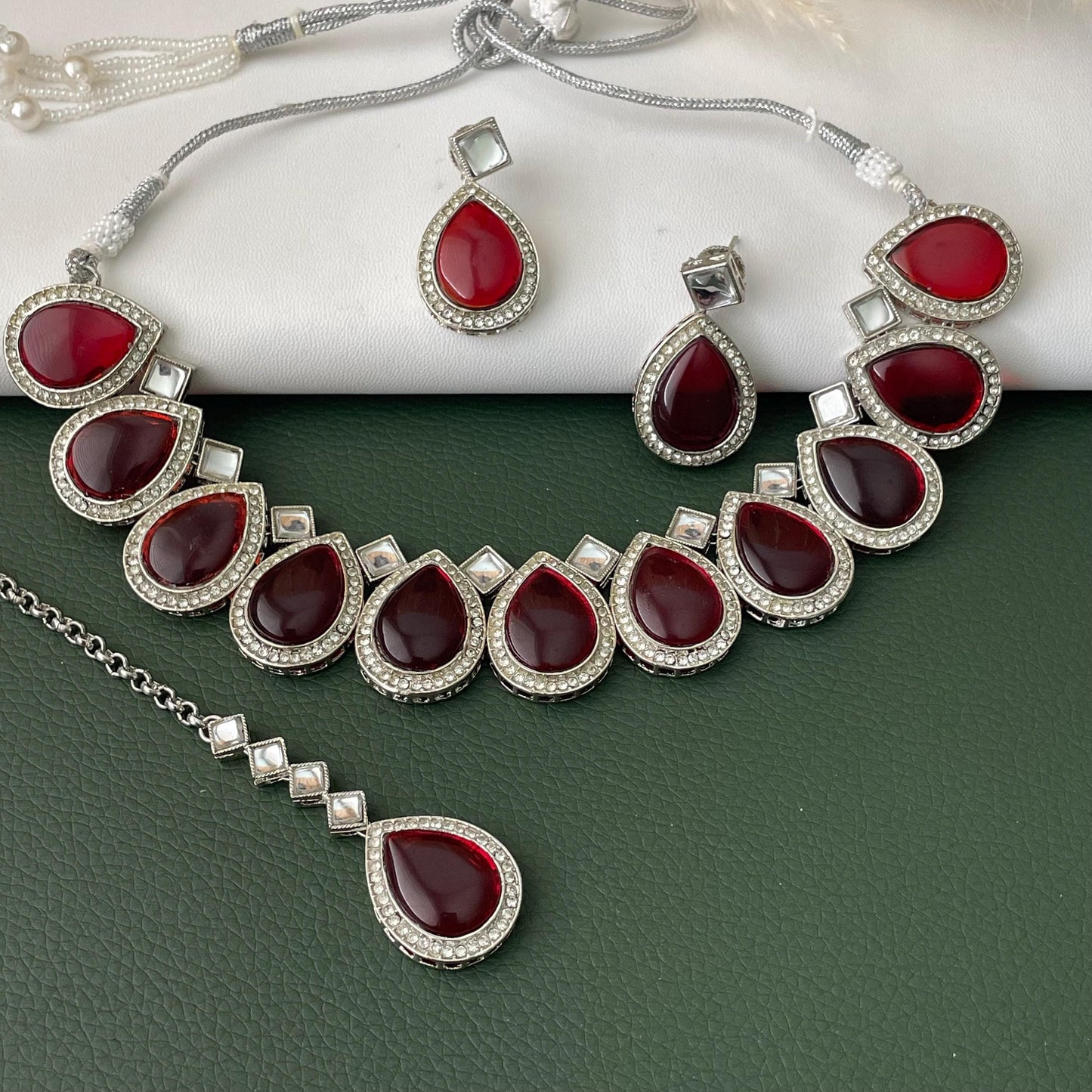 Maroon color kundan and AD necklace set with Maang tika Diwali party wear