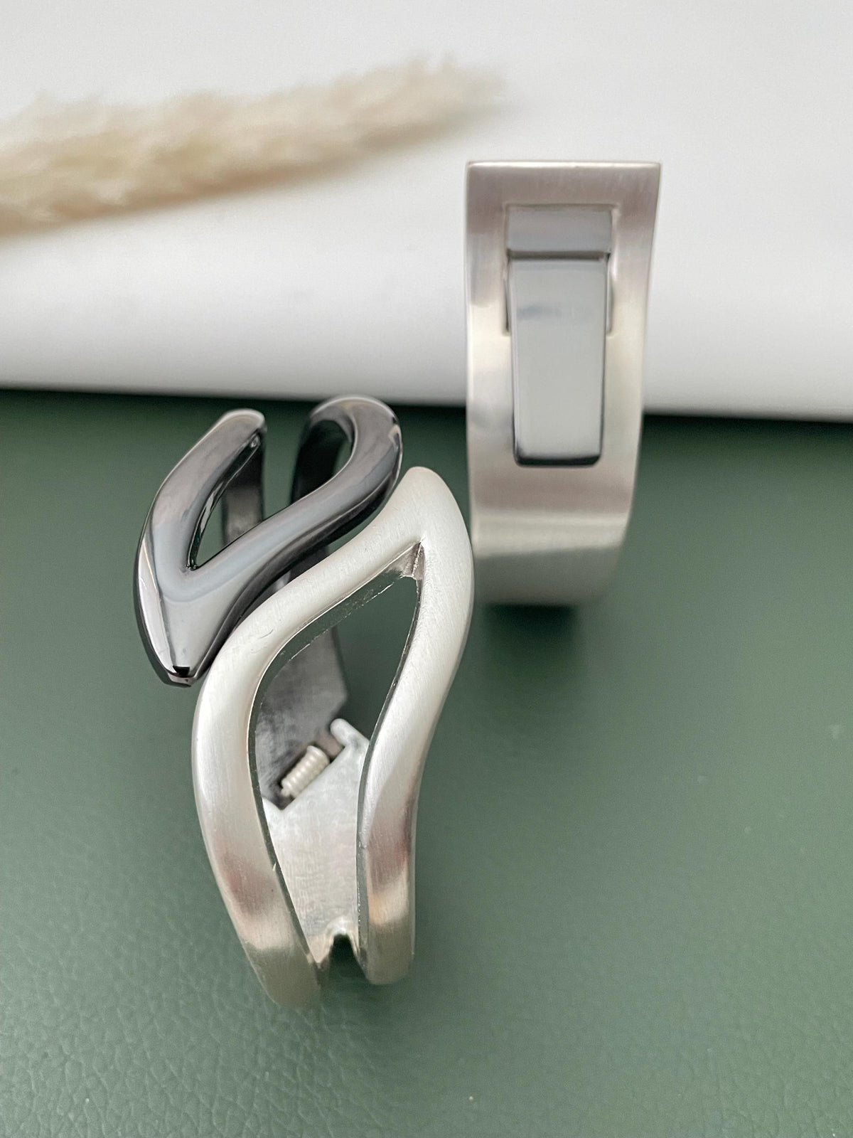 Silver and black fancy cuff bracelets