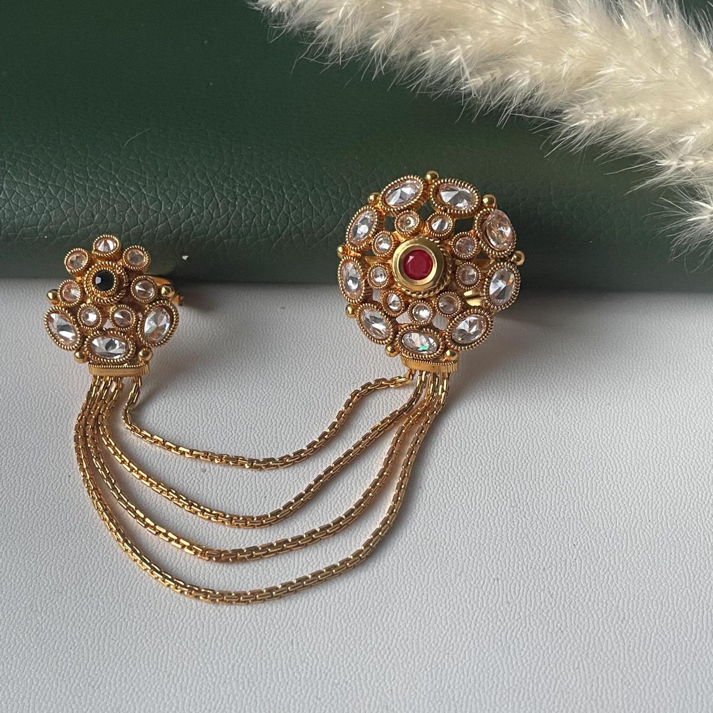 Gold plated two finger kundan chain ring