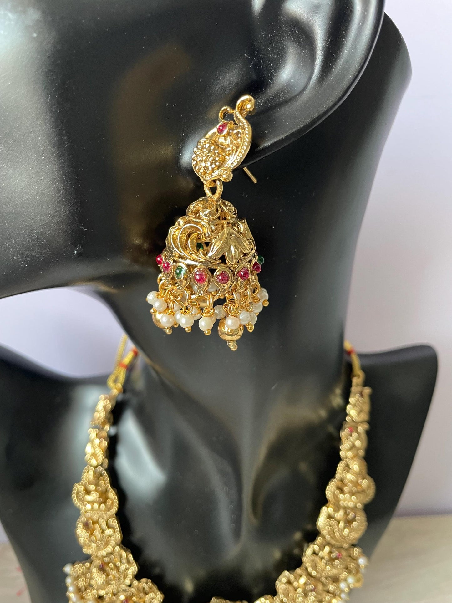 Lakshmi pendent kemp stone antique gold plated choker set with earring in green