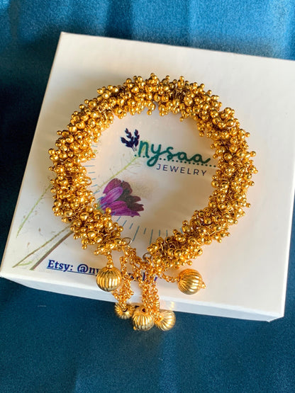 Gold Plated Pearl Bracelet: Adjustable Retractable Design