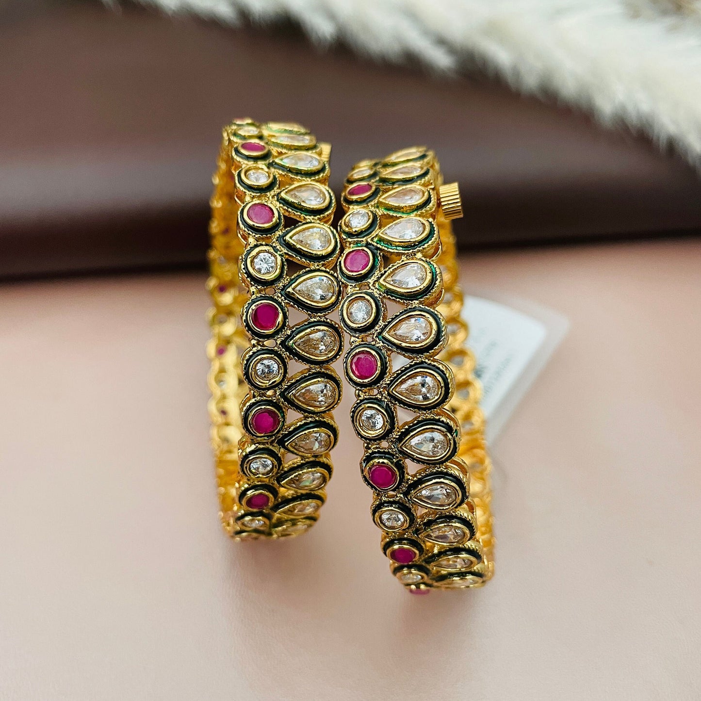 Antique gold plated North Indian party wear bangles with white and Ruby stones