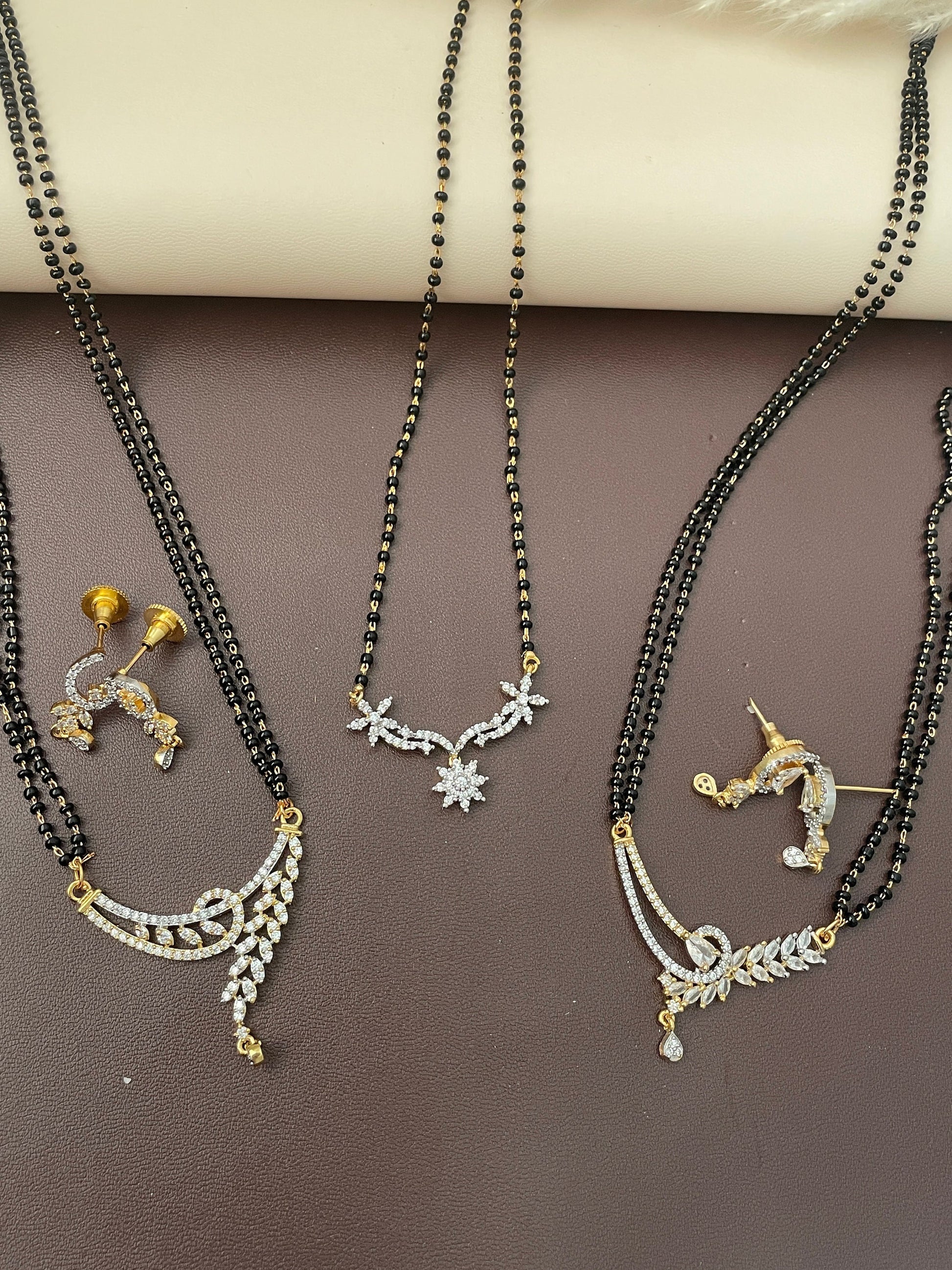 American Diamond gold plated black beads mangalsutra with matching AD earrings