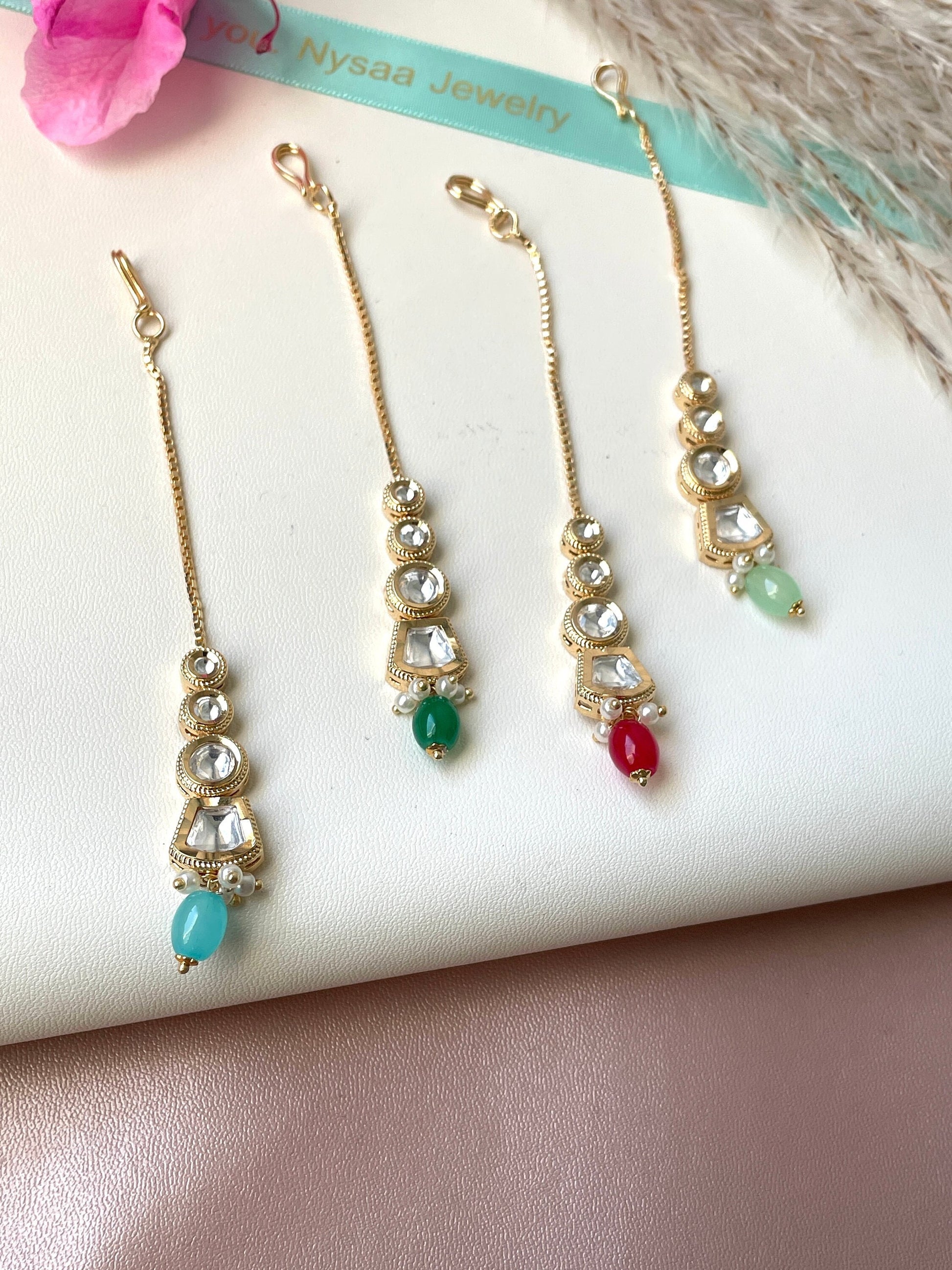 Gold plated kundan pearl and high quality beaded maang tika. Minimalistic jewelry