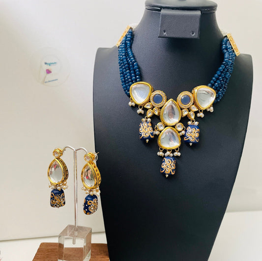 Royal blue premium quality kundan choker set . Comeswith matching earrings. It’sa hand painted set .