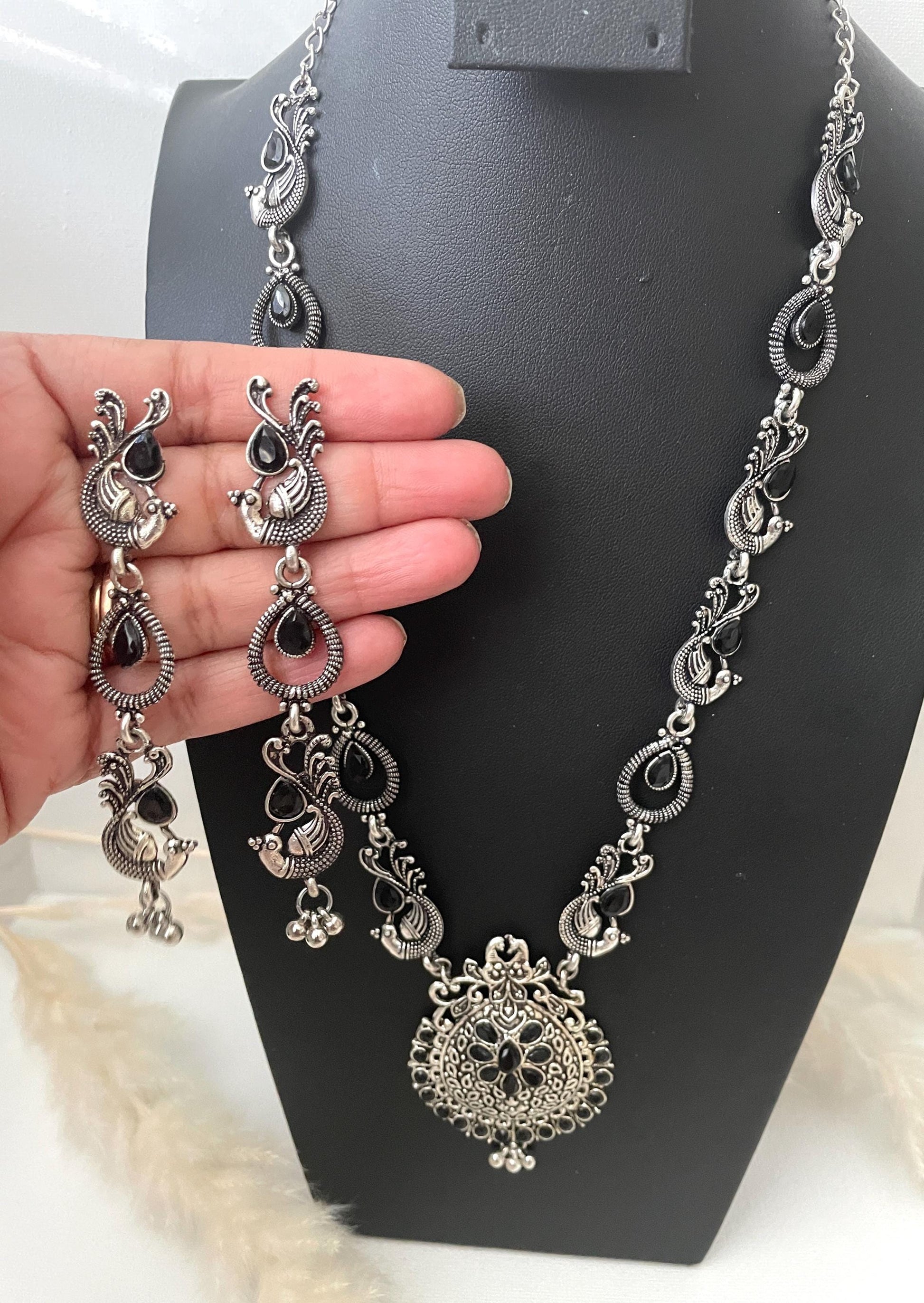 Nysaa Peacock themed Oxidized Necklace set with black stones long earrings