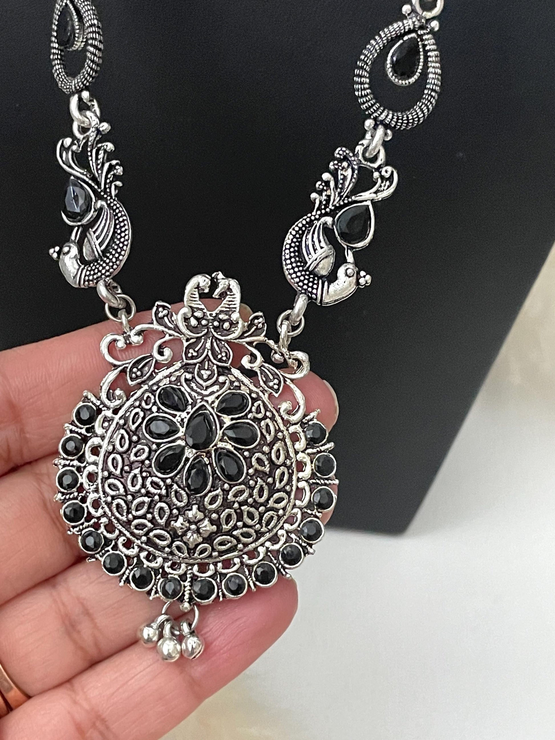 Nysaa Peacock themed Oxidized Necklace set with black stones long earrings