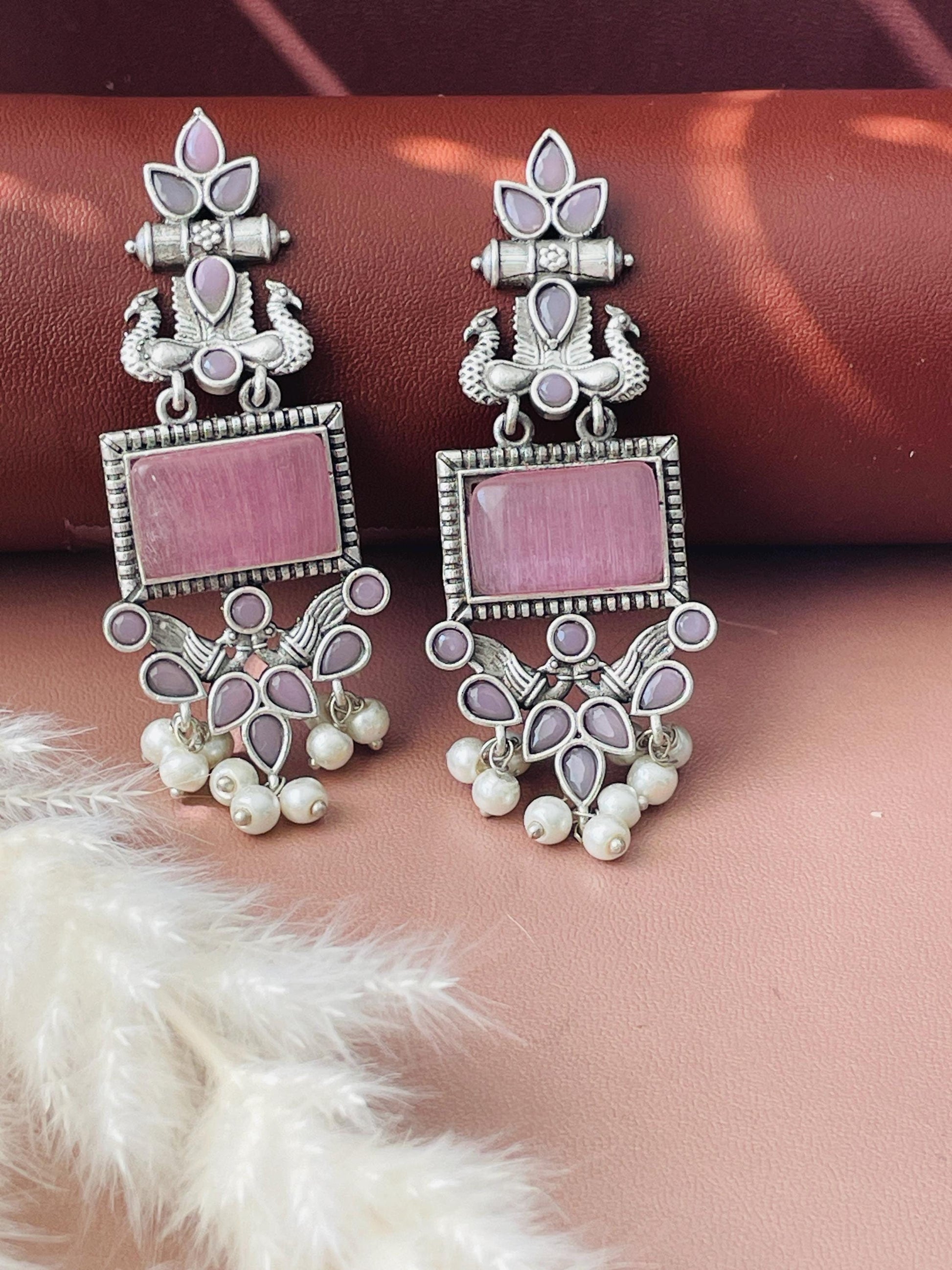 High quality colored Mona Lisastone Oxidised earrings . Pink black and yellow colors available.