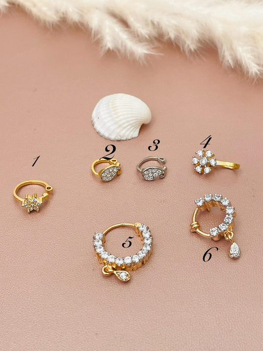Gold plated cubic zirconia nose pins . Delicate and stunning pieces .