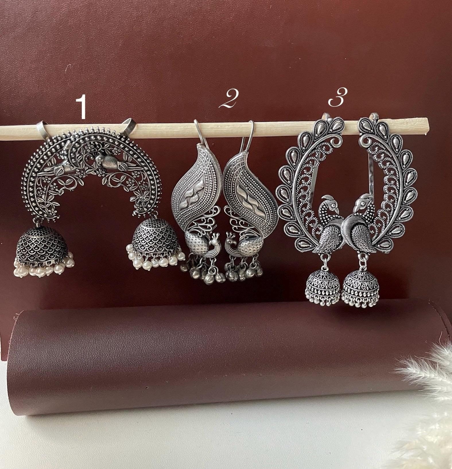 Oxidised earcuffs kaanohool . Trendy earrings that covers the ear. High quality , intricate design