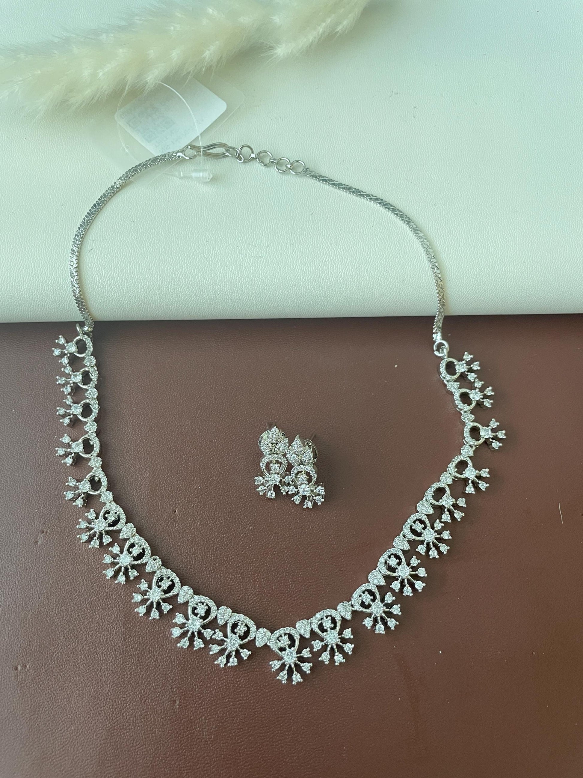 Asymmetrical Cubic Zirconia Necklace Set: Rhodium Plated Wedding Jewelry