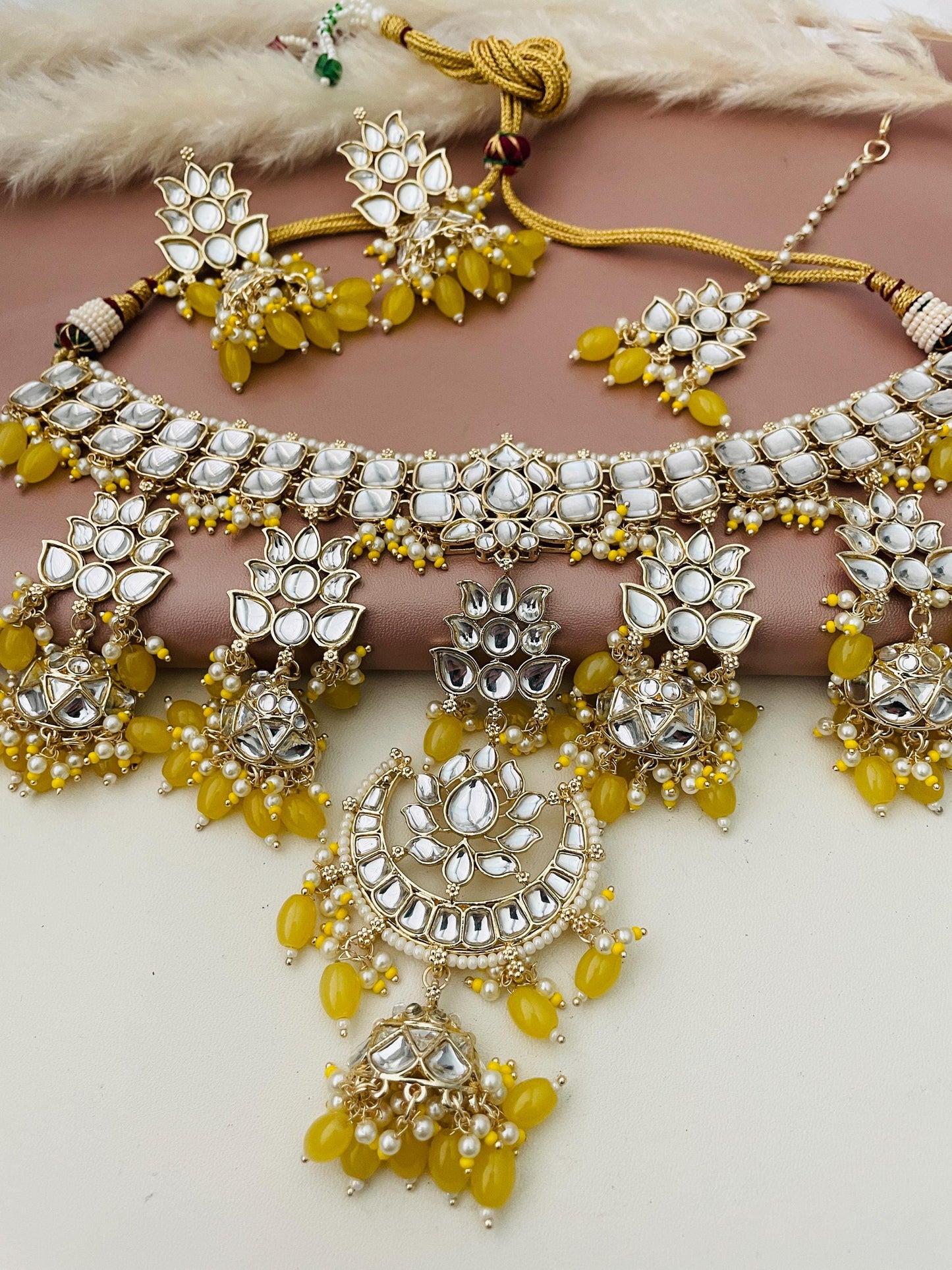 Stunning yellow beads and affordable kundan necklace with matching earrings and maang tika . Chandbali pendant and 1.5 inch long earrings