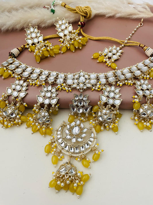 Stunning yellow beads and affordable kundan necklace with matching earrings and maang tika . Chandbali pendant and 1.5 inch long earrings