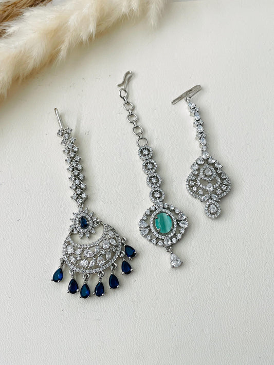 High quality cubic zirconia maang tika in dark blue , mint and white colors