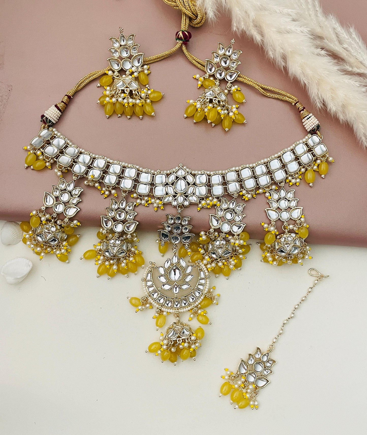Stunning yellow beads and affordable kundan necklace set with matching earrings and maang tika . Perfect for Mehandi , sangeet or even Indian wedding