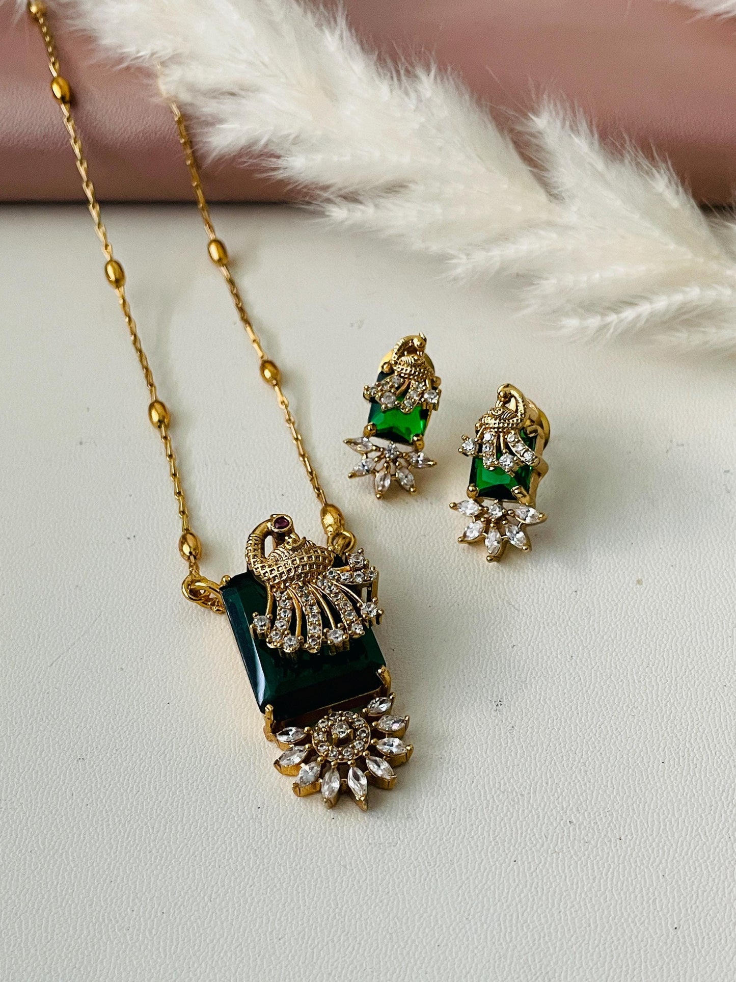 Gold plated CZ necklace set in peacock theme.
