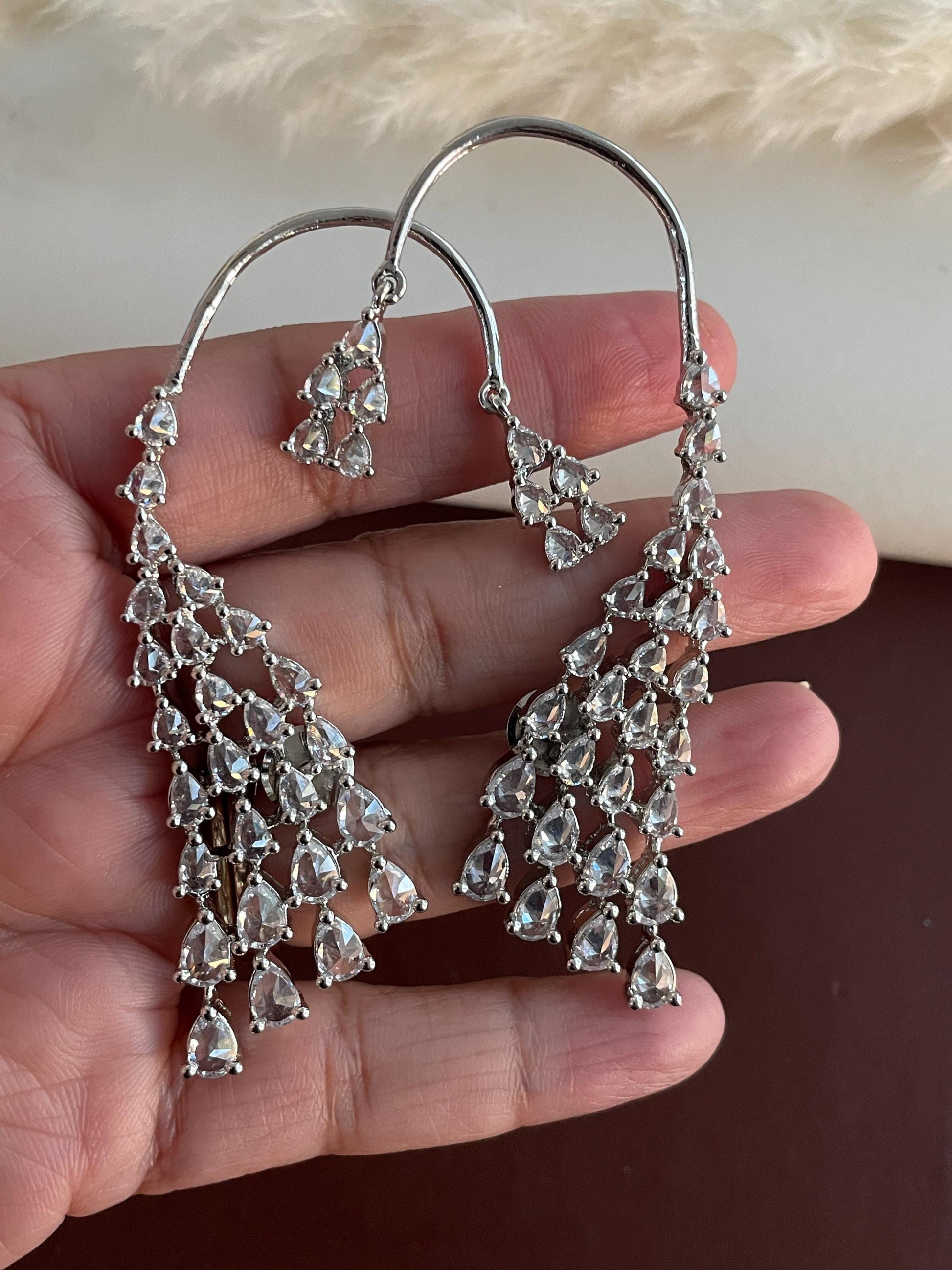 Cubic Zirconia Dangle Earrings: Rhodium Plated Jhumke Style