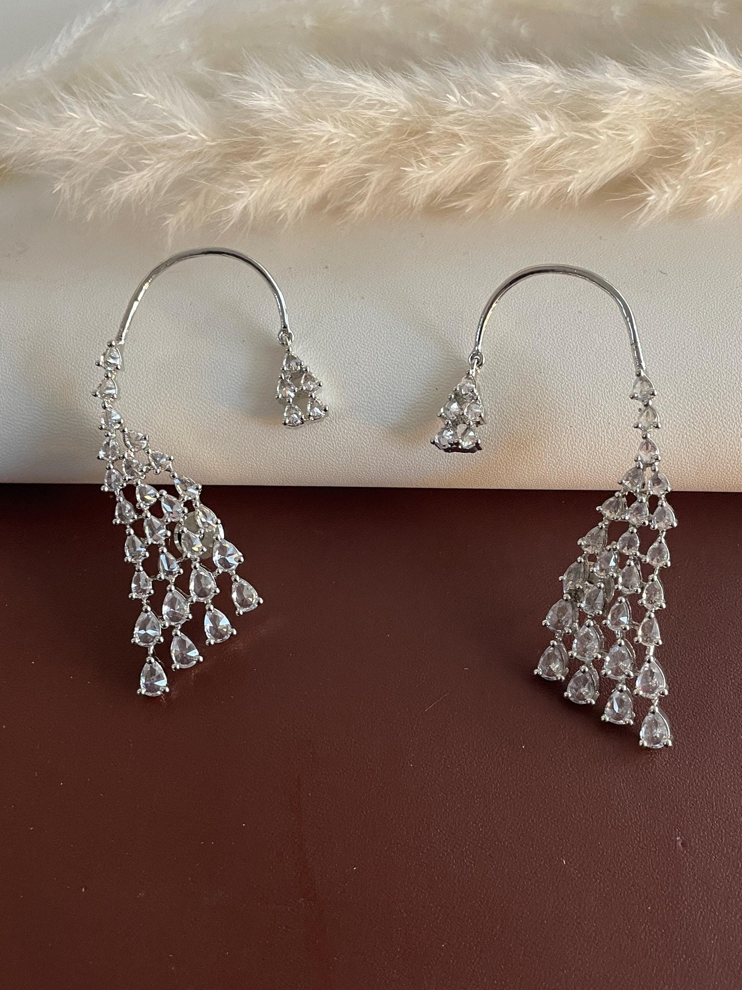 Cubic Zirconia Dangle Earrings: Rhodium Plated Jhumke Style