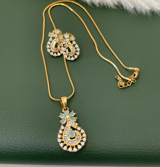 Stunning yet very elegant mint CZ pendant necklace set with matching earrings. Gold plated , very high quality