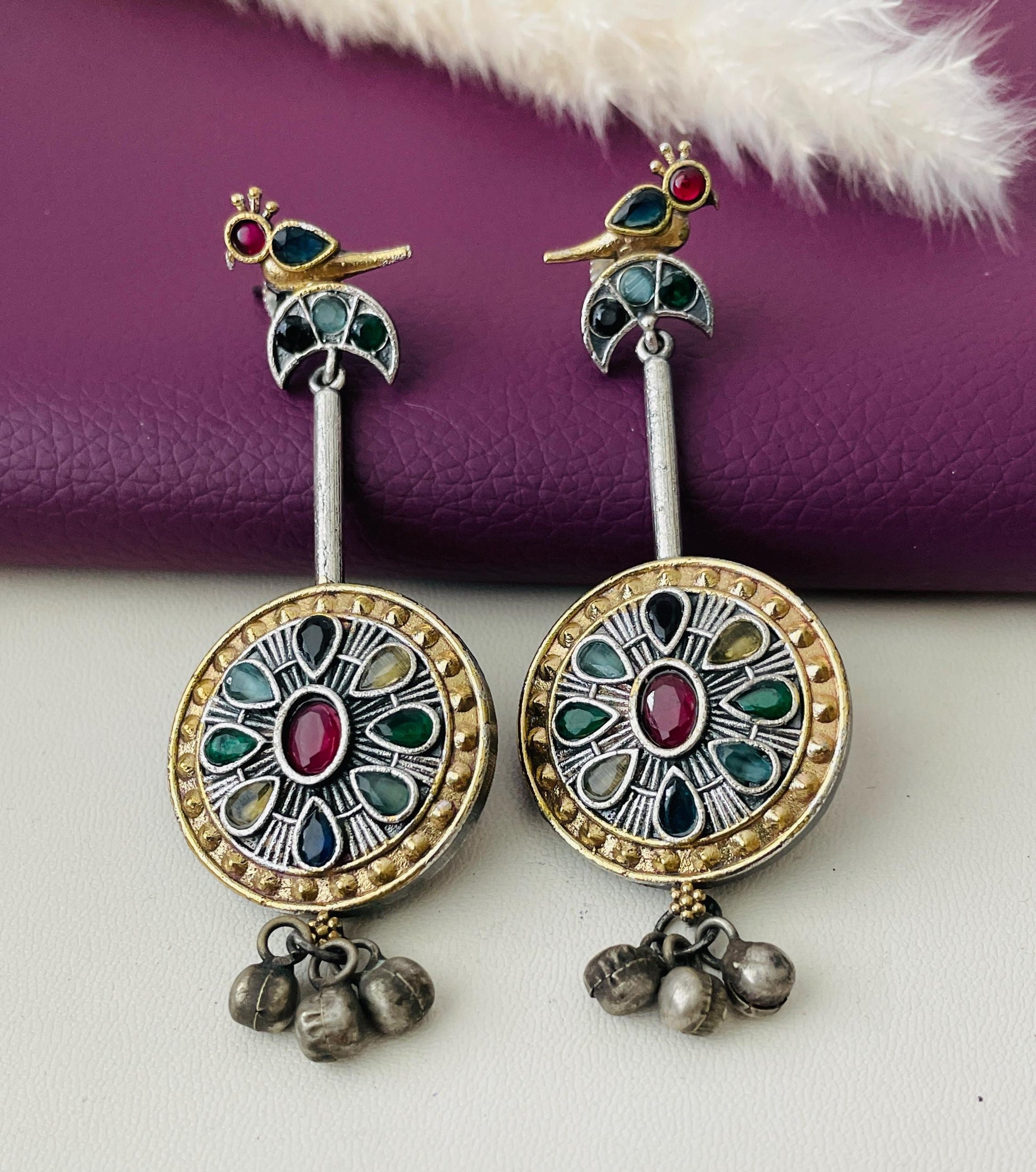 Dual tone multicolor lightweight black Oxidised earrings.Beautiful bird motif. Trendy and rare find