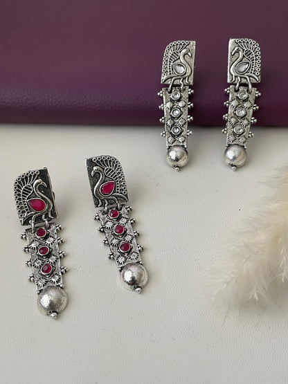 Silver lookalike peacock Oxidised earrings in Ruby and white