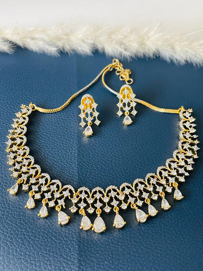 Beautiful high quality twotoned CZ necklace set with earrings . Shine in these stone shows the quality of this piece.