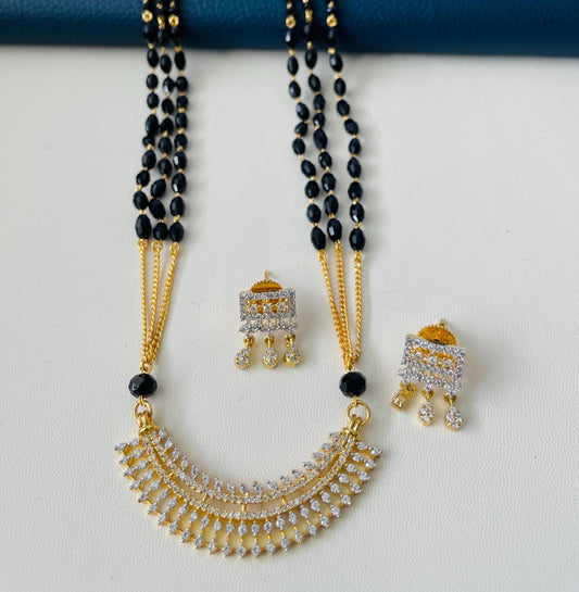 American Diamond gold plated 3 strand mangalsutra set with matching earrings.