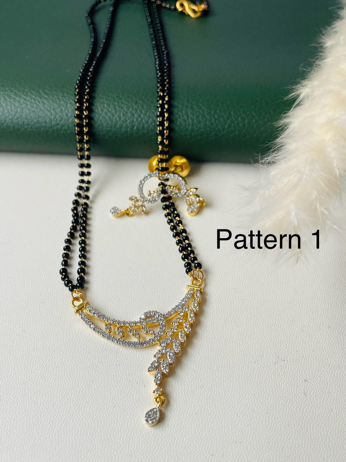 American Diamond Mangalsutra with Earrings: Gold Plated Dual Tone Necklace