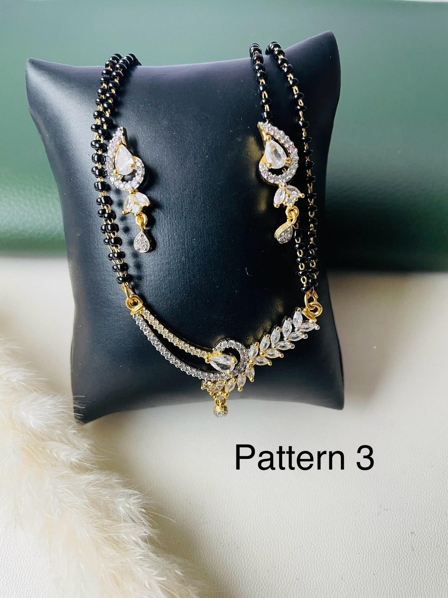 American Diamond Mangalsutra with Earrings: Gold Plated Dual Tone Necklace