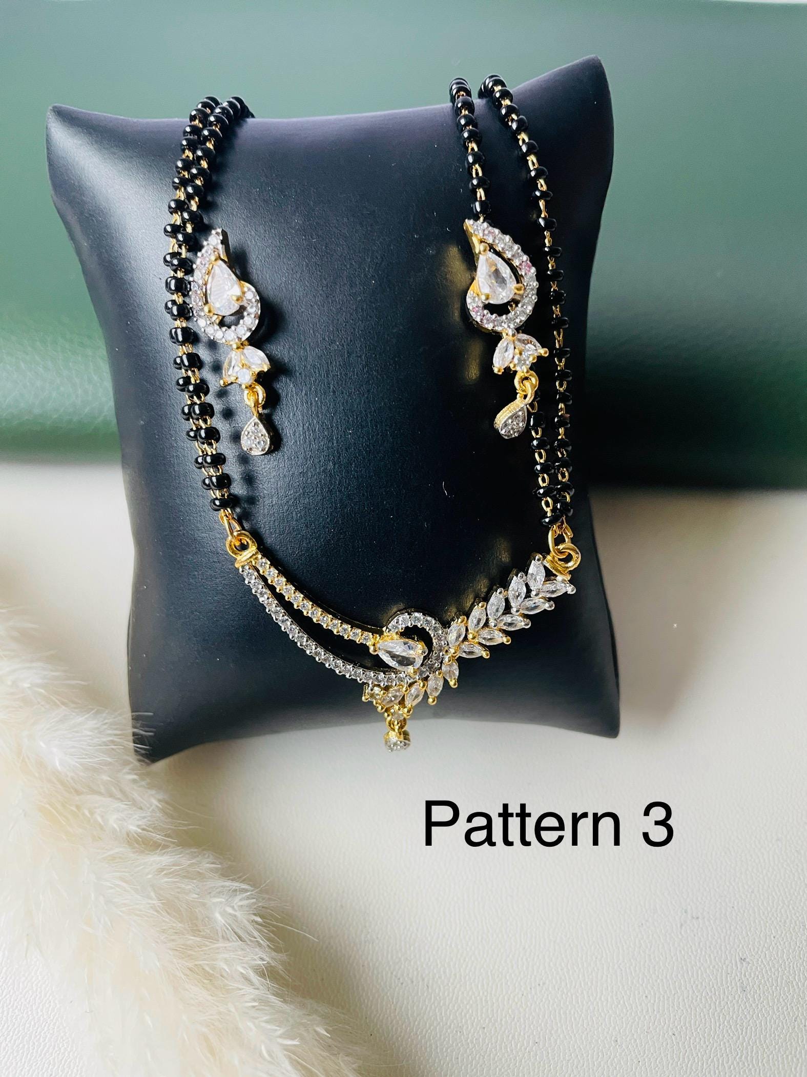 American Diamond Mangalsutra with Earrings: Gold Plated Dual Tone Necklace