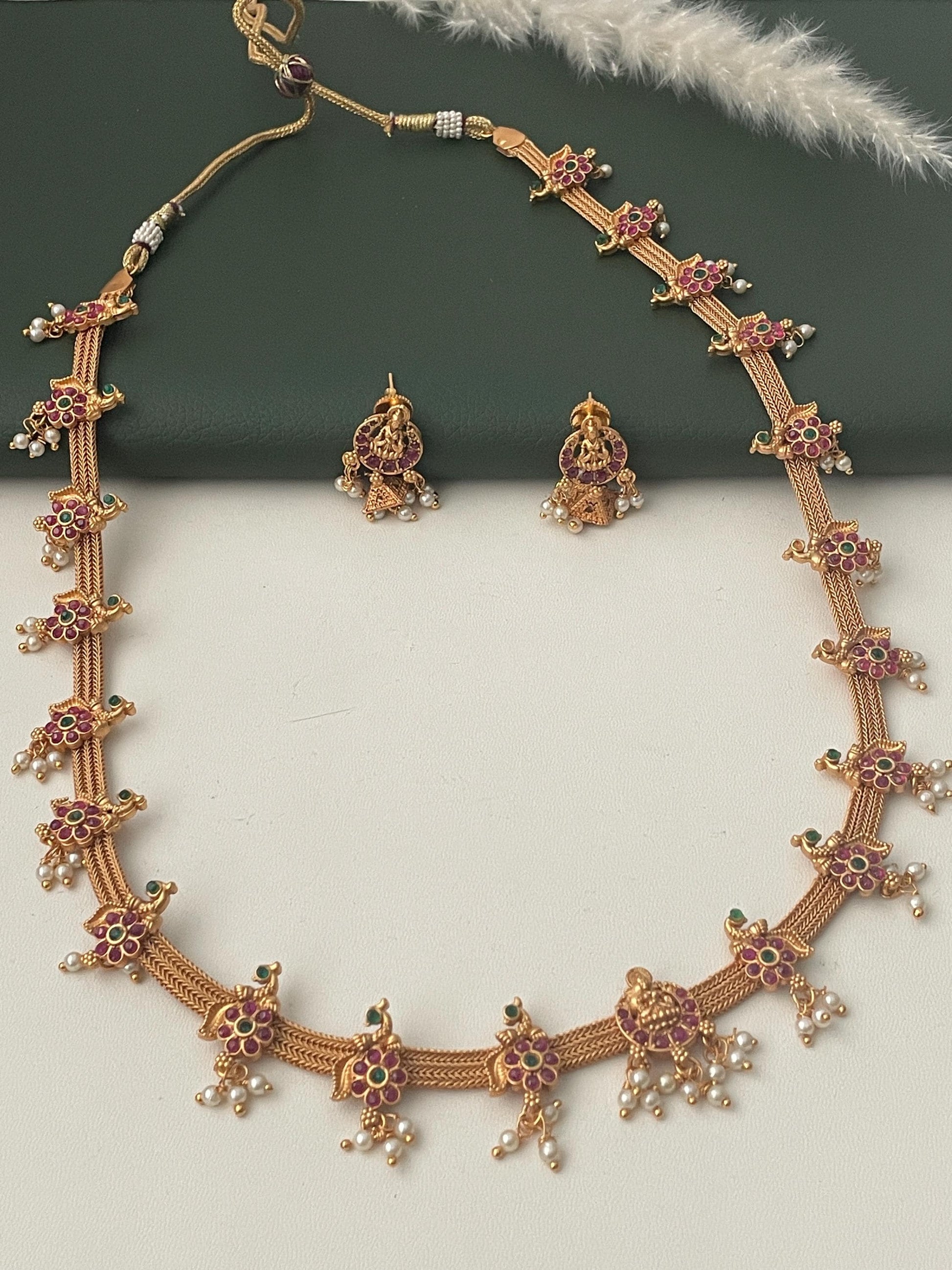 Kemp stone gold plated necklace with matching earrings