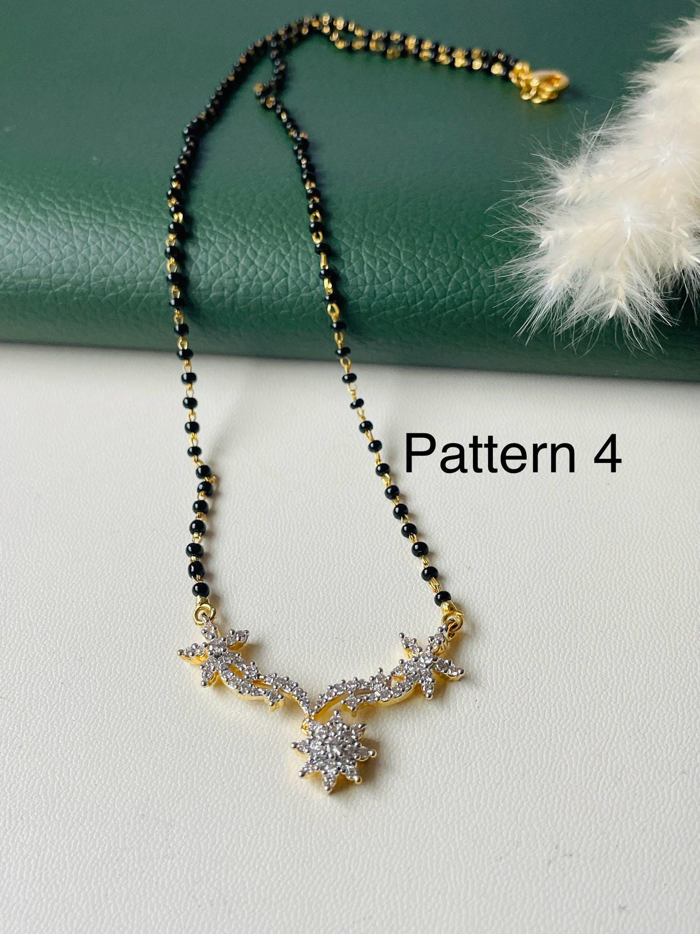 American Diamond Mangalsutra with Earrings: Gold Plated Dual Tone Necklace