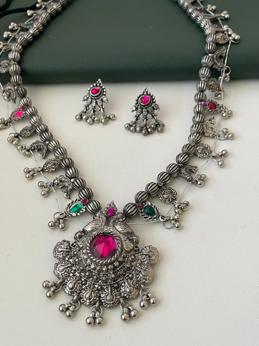 Oxidised kolhapuri saaj With matching earrings . This is tmore like black than shiny Oxidised set . 24 inch long with traditional motif like masali ( fish ), paan ( leaf)