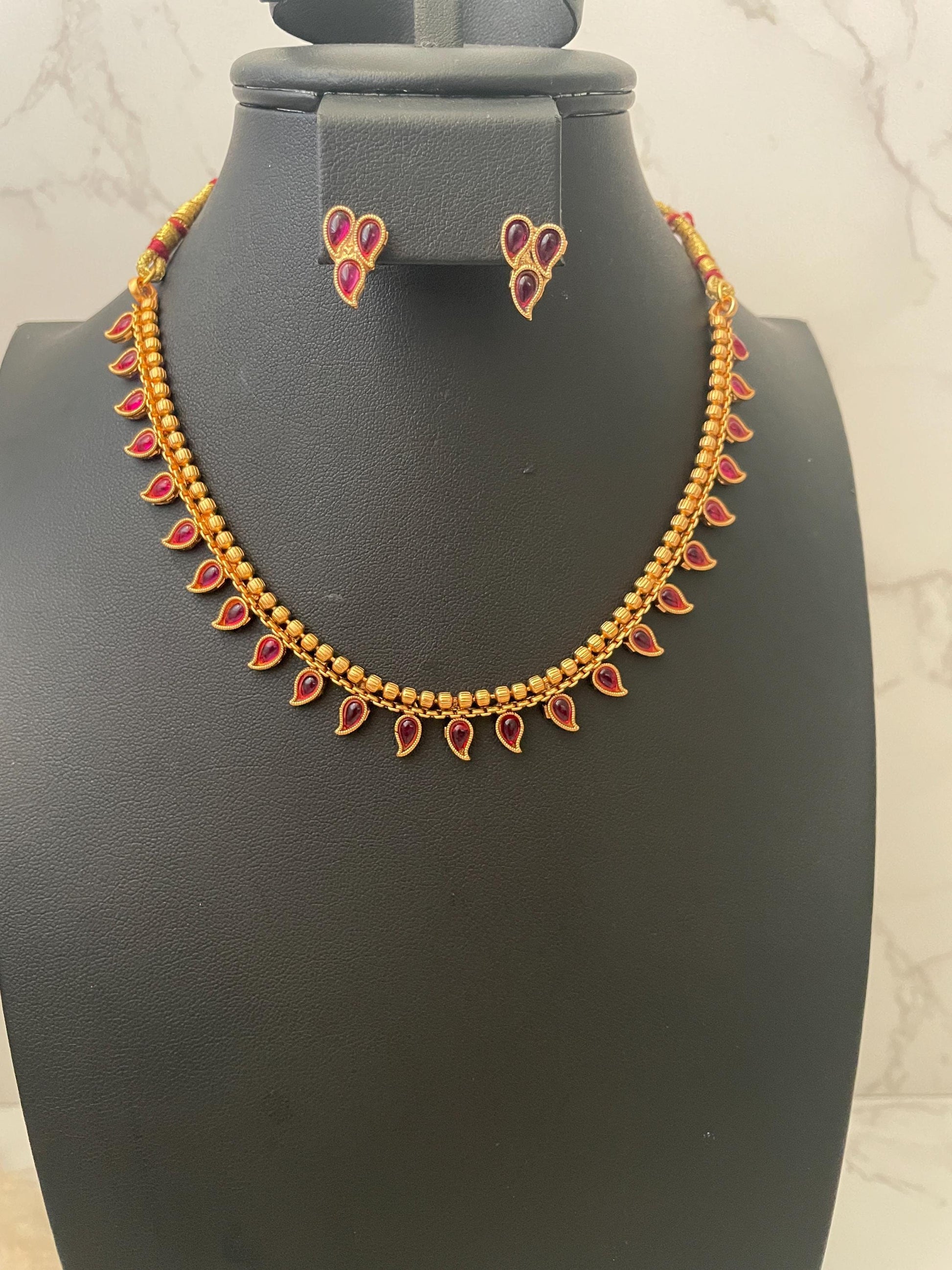 Ruby stone gold plated short necklace with matching earrings