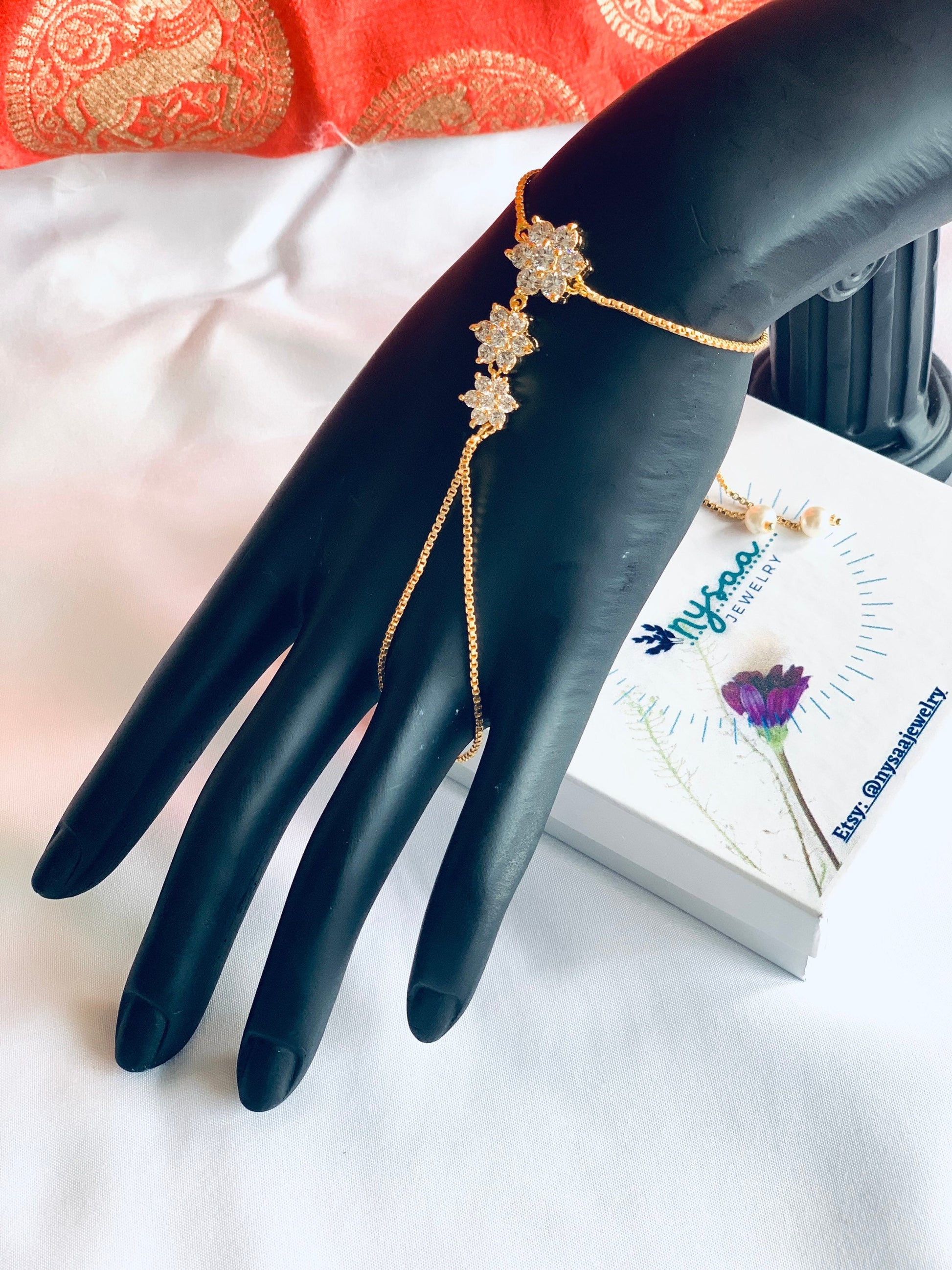 Cubic zirconia kundan haath phool 
Diwali jewelry Diwali gifts