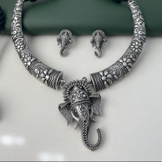 High quality black Oxidised  Ganapati pendant hasli neck set . Very high quality and intricate carving .