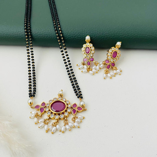 Gold Plated Tanmani Mangalsutra Set: Black Beads, Ruby Pendant