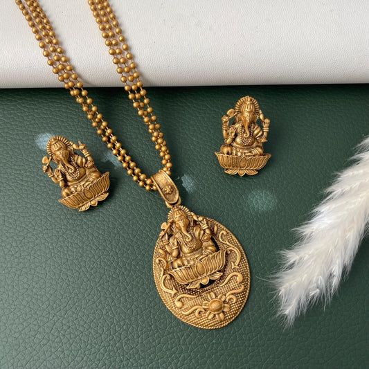 Rajawadi polish  GaneshJi 18 inches pendant set with matching earrings. Very intricate carving with three beads strands