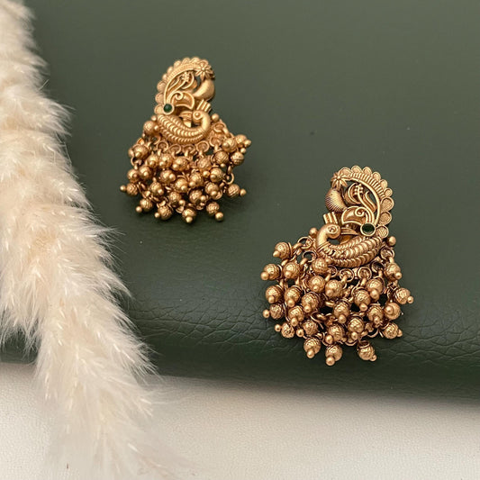 Antique gold plated peacock earrings. Very unique design and lightweight jewelry