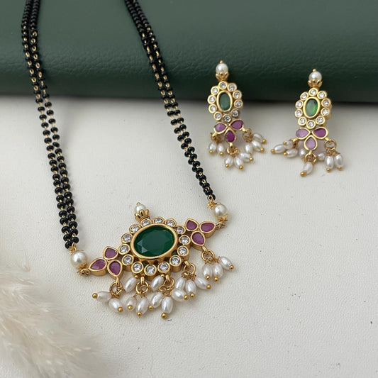 Gold Plated Tanmani Mangalsutra Set: Black Beads, Ruby Pendant