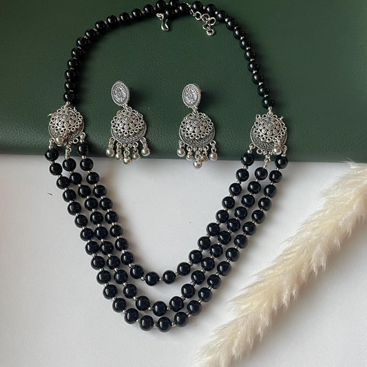 Oxidised big black beads three layered fancy necklace set with matching earrings