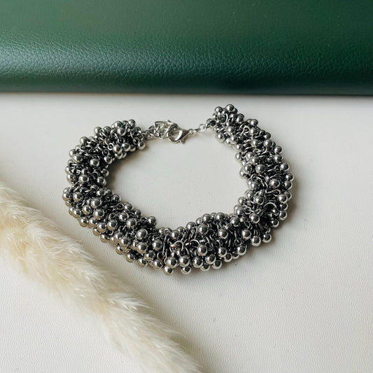 Stunning lightweight ghungaroo bracelet. Ghungaroos are clustered together. Adjustable.