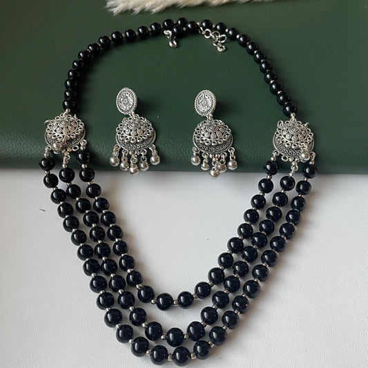 Oxidised big black beads three layered fancy necklace set with matching earrings
