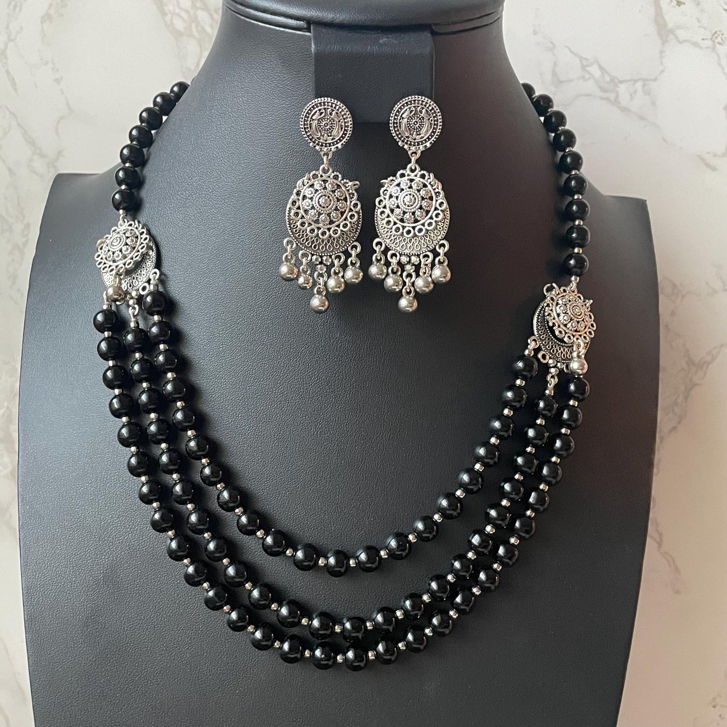 Oxidised big black beads three layered fancy necklace set with matching earrings