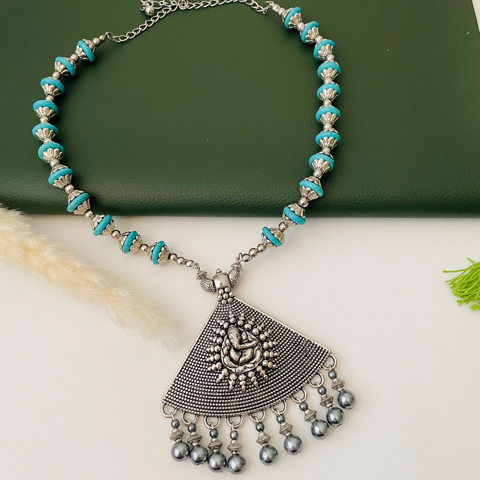 Nysaa Oxidised blue grey Ganapati pendent necklace